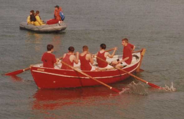 A BP18 crew at the Sea Scout Regatta. The BP18 is the official sea scout boat in Ireland and can be both rowed and rigged for sail.