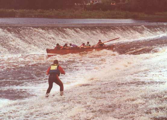 The TaurusII shoots Bennetsbridge wier as San O Seaghadh looks on