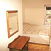 A view of a family room with double bed. Childrens bunks and cots are also available.