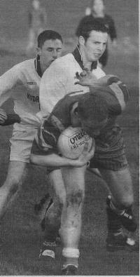 Midfield action during the match between Ardara and Fanad