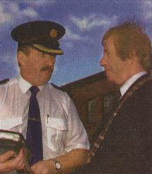 Garda Nacie Rice shows Charlie Bennett the breathaliser