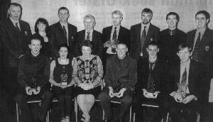 The award winners at the Ardara dinner dance. Front, l. to r., Eamon Doherty (Senior Player of the Year); Teresa McGroarty (Lady Player of the Year), Claire Boyd (Supporter of the Year); Brendan Boyle (Minor Player of the Year; Paddy Gallagher (Reserve Player of the Year) and Anthony Harkin (Clubperson of the Year). Back, l. to r., Anthony Molloy, chairman; Mary McHugh-Kelly, PRO; James McHugh, secretary; Johnny D.Earley, senior team manager; Frank O'Donnell, special guest; Stephen McCahill, treasurer; Damien Diver, county captain and John McConnell, county chairman.