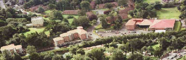 Aerial View of Brookfield Holiday Village with Jenning's Pool to the Left, Leisure Centre and Hotel to the Right and the Holiday Blocks to the Centre