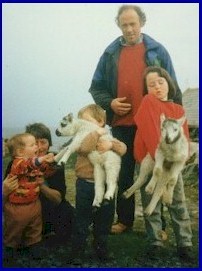 The whole family with lambs