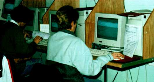 Parents learning computer skills in St Kevin's